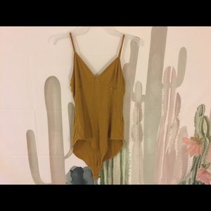 Two tanks and a bodysuit